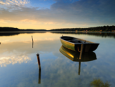 boat on a still lake