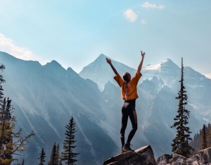 Lady raising hands in joy. Cancer recovery at Summit Healing Arts